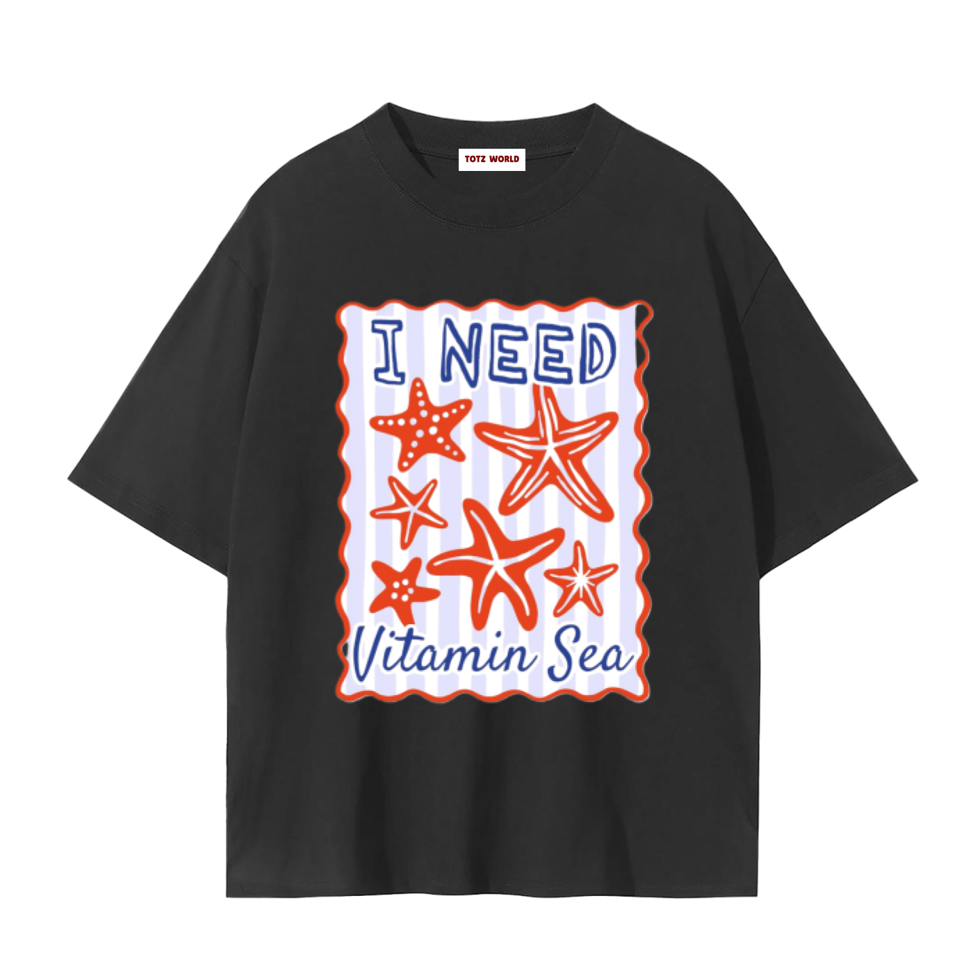 A black TOTZ WORLD Beach short-sleeve t-shirt with a graphic print on the front featuring the text 'I NEED Vitamin Sea' in blue and orange, surrounded by orange starfish illustrations on a white and light blue striped background.