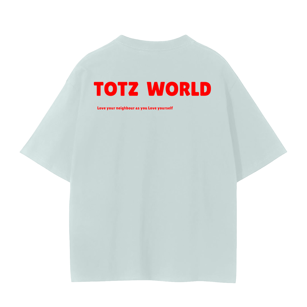 A light blue premium cotton weighted short-sleeve t-shirt shown from the back, featuring the brand name 'TOTZ WORLD' printed in bold red letters across the upper back, with a smaller red slogan underneath.