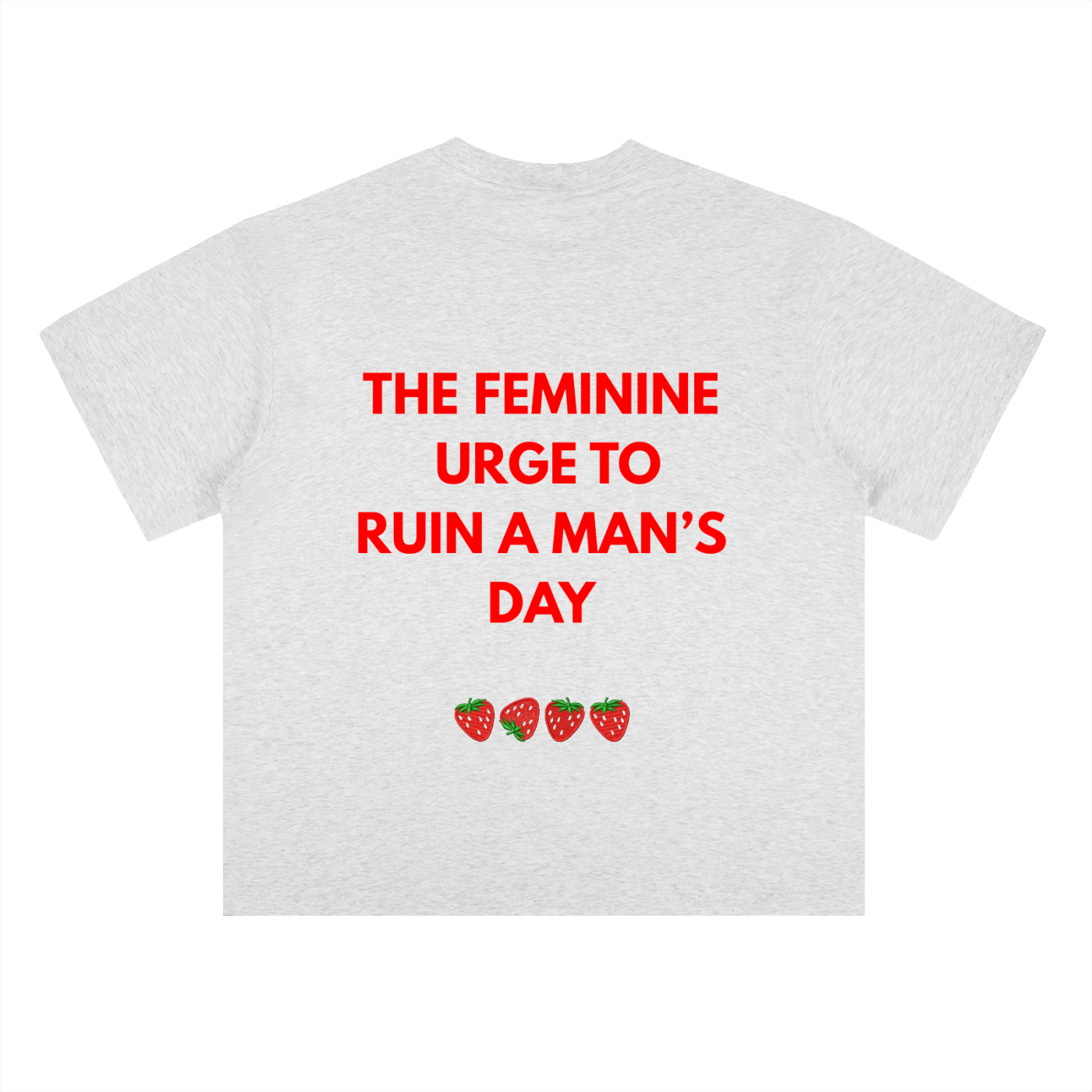 A light heather TOTZ WORLD heavyweight cotton gray t-shirt with bold red text reading 'THE FEMININE URGE TO RUIN A MAN'S DAY' and three small strawberry graphics below, shown on a plain white background.