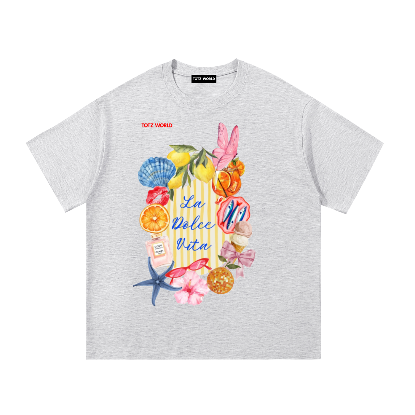 A light heather gray T-shirt with a colorful beach-themed graphic print featuring seashells, starfish, flowers, and the text 'La Dolce Vita' 