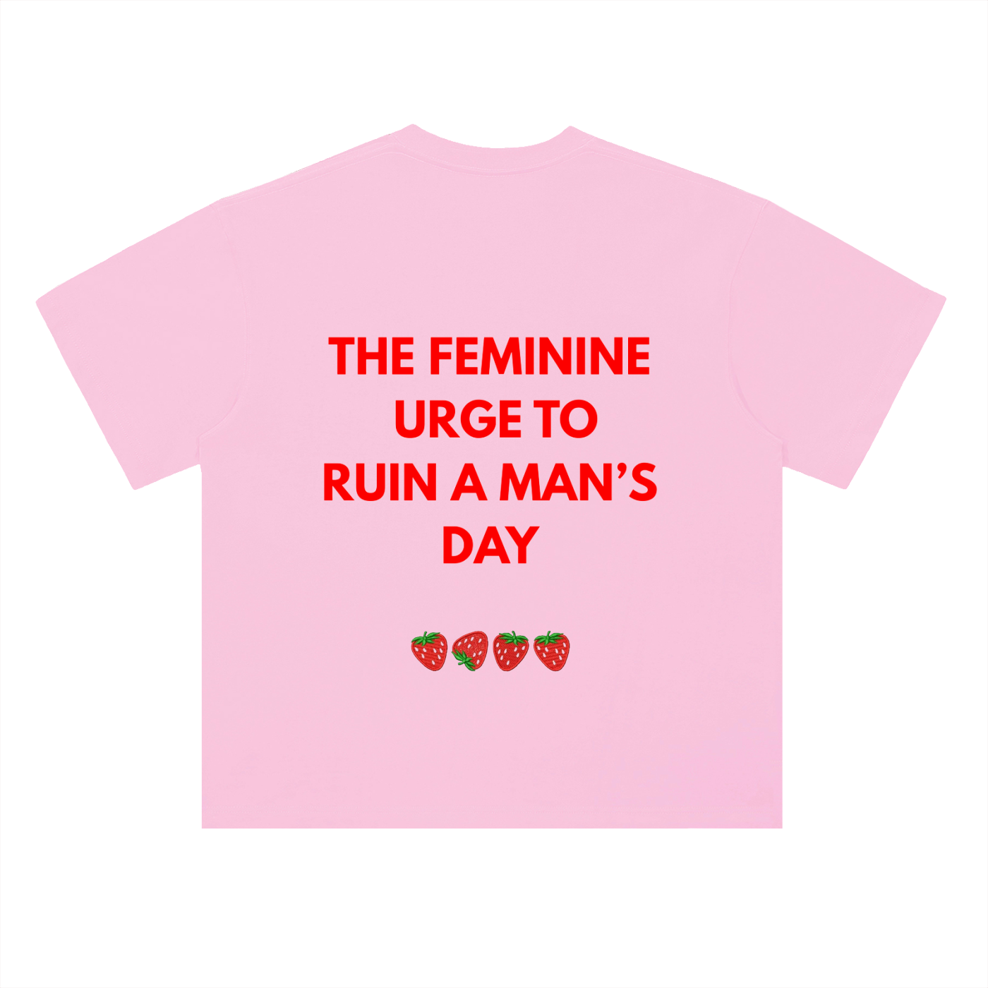 A light pink TOTZ WORLD heavy weight cotton short-sleeve t-shirt with bold red text reading 'THE FEMININE URGE TO RUIN A MAN'S DAY' and three small strawberry graphics below, shown on a plain white background.