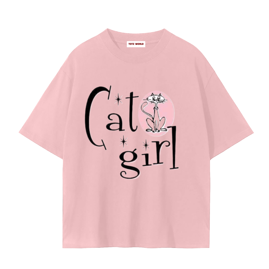 A light pink TOTZ WORLD short-sleeve t-shirt with a graphic print on the front that reads 'Cat girl' in black script, featuring a cute cartoon cat inside a pink circle.